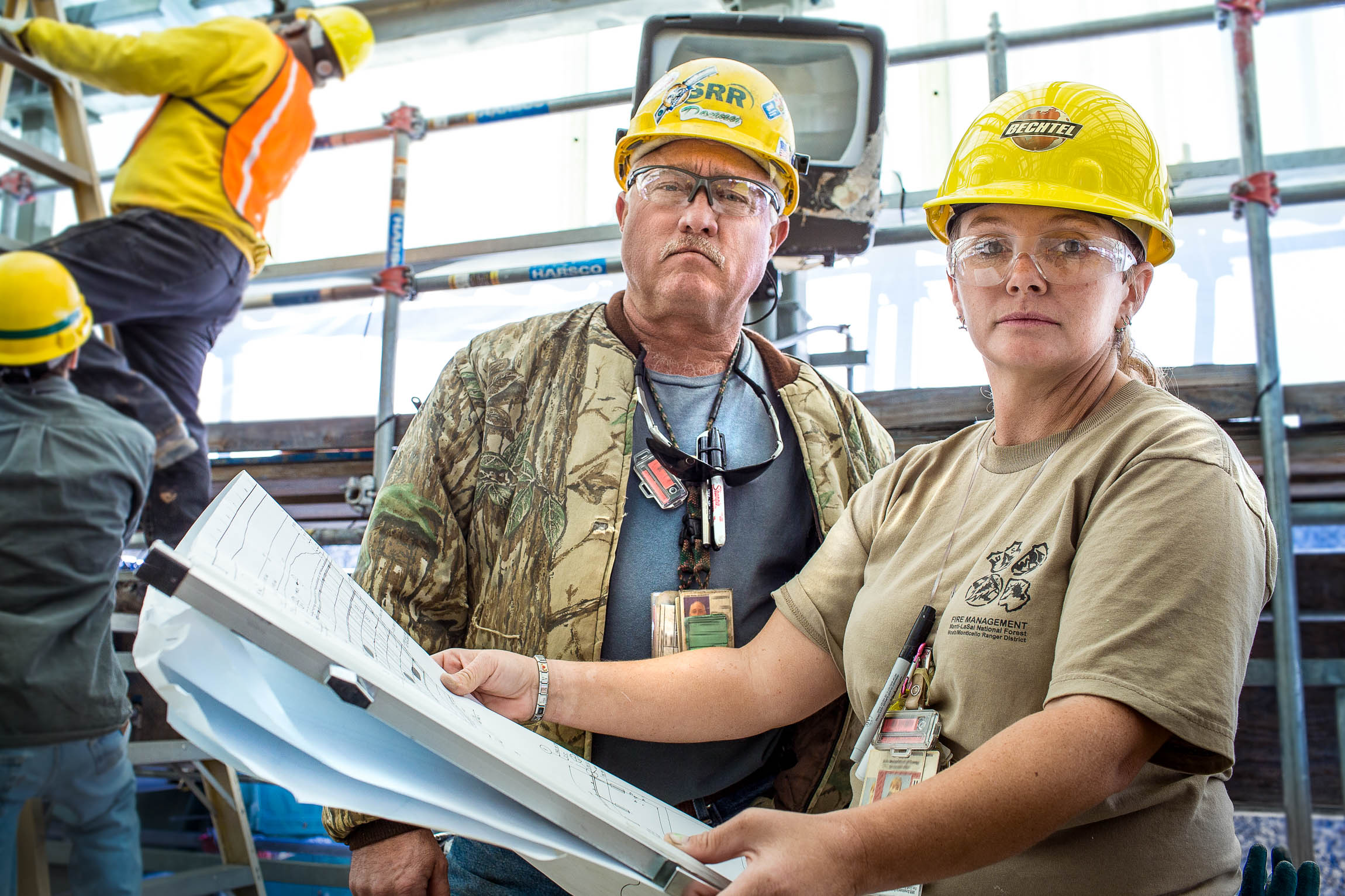 Construction Workers Review Atlanta Site Plans