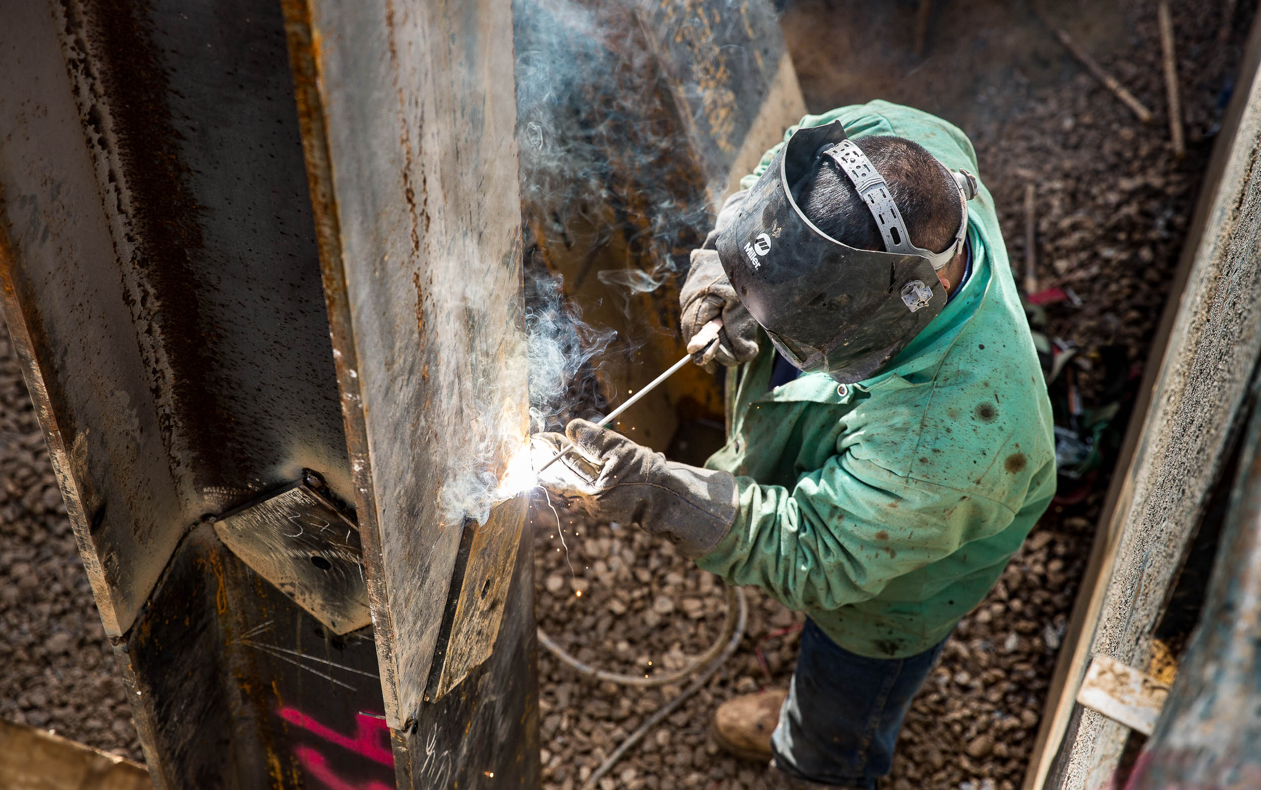 Iron Worker Welds While Photo is Taken by Atlanta Photographer