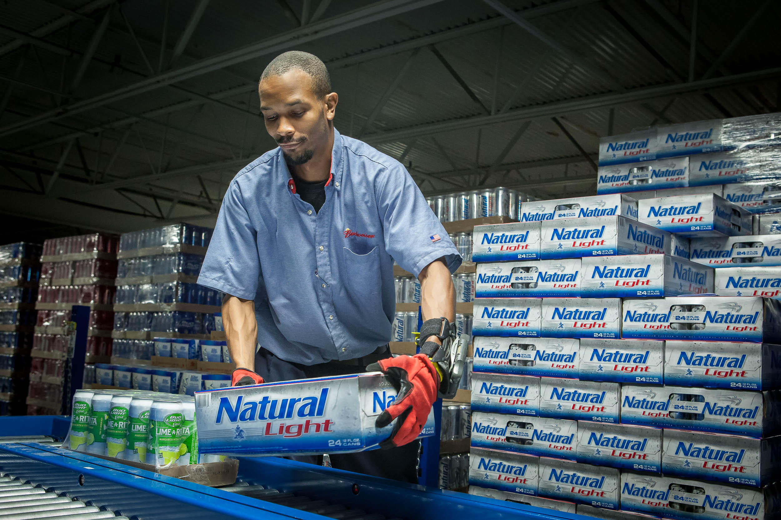 Warehouse Employee Loads Beer from Pallet for Atlanta Photographer