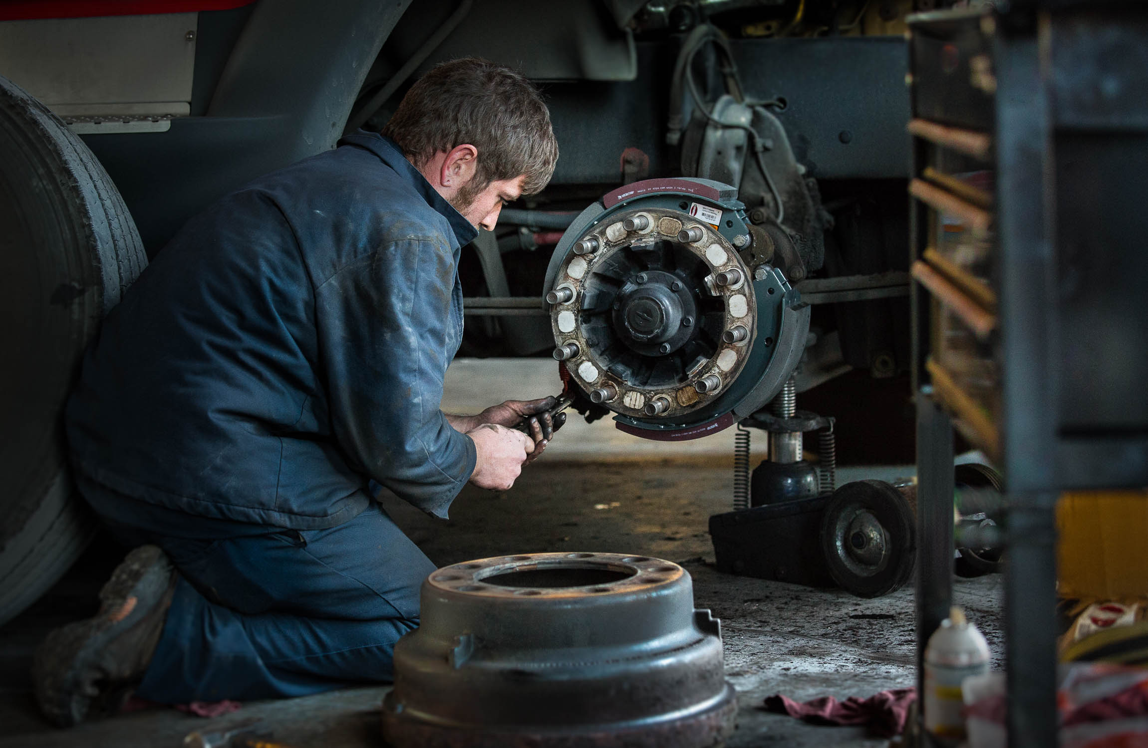 Truck Mechanic in Atlanta Installs Brakes for Photographer