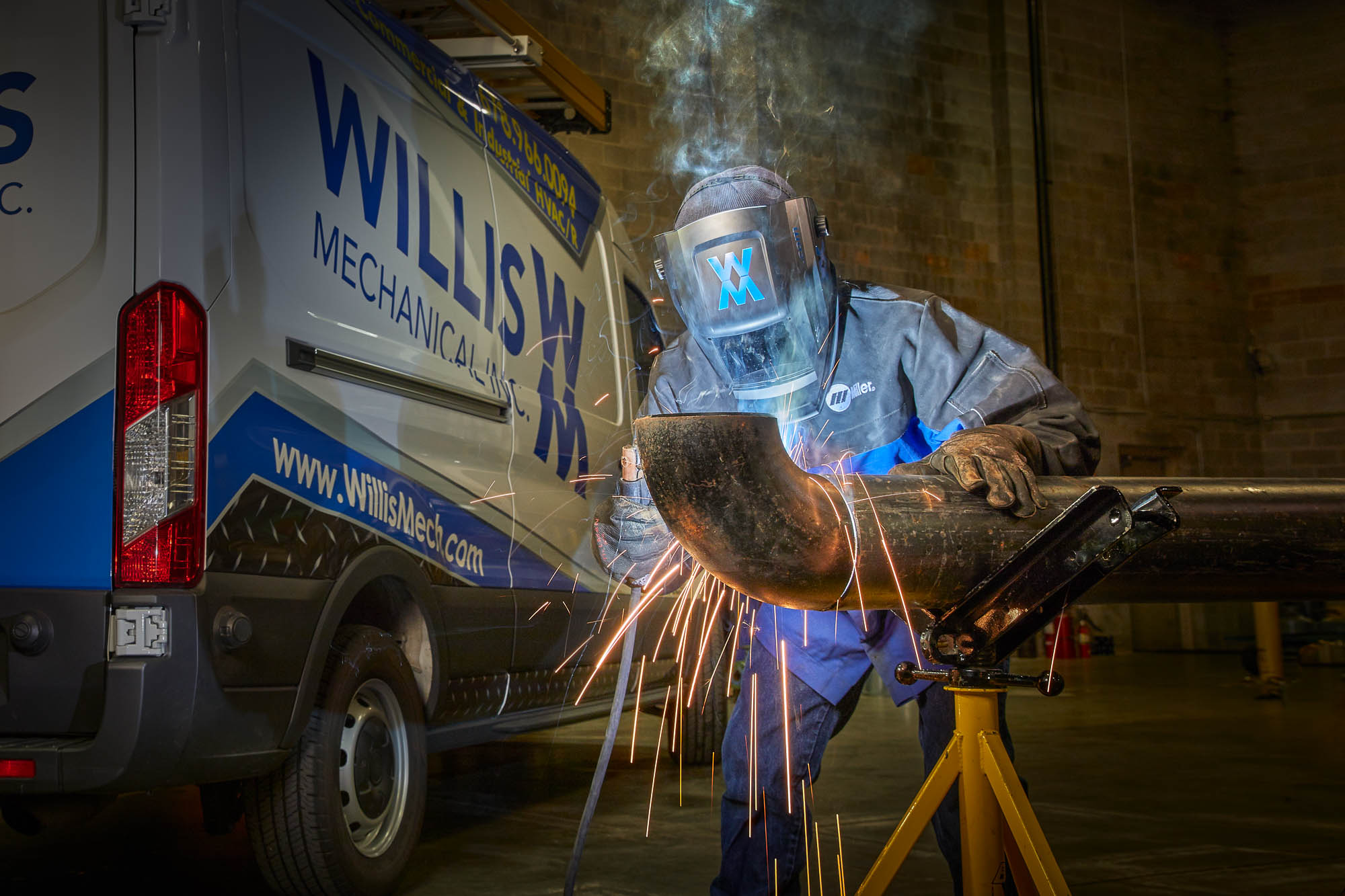 Photography of Welder at Atlanta Warehouse
