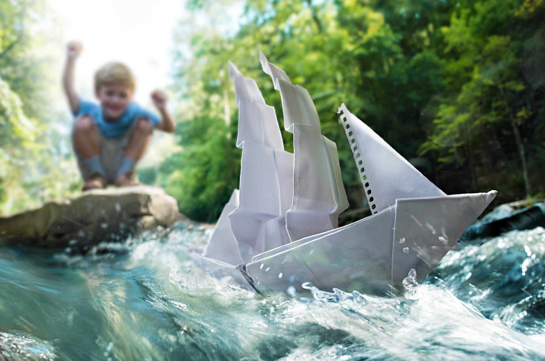 Boy Floats Boat in Creek by Atlanta Lifestyle Photographer